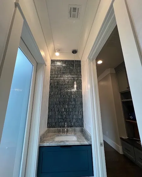 Deep blue painted bathroom vanity